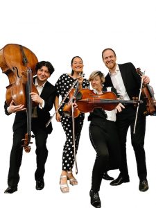 Members of Thalea String Quartet pose with their instruments